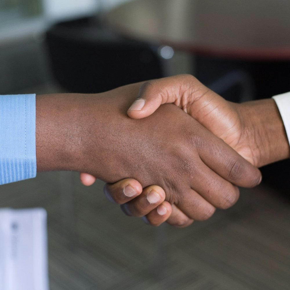 Two people shaking hands